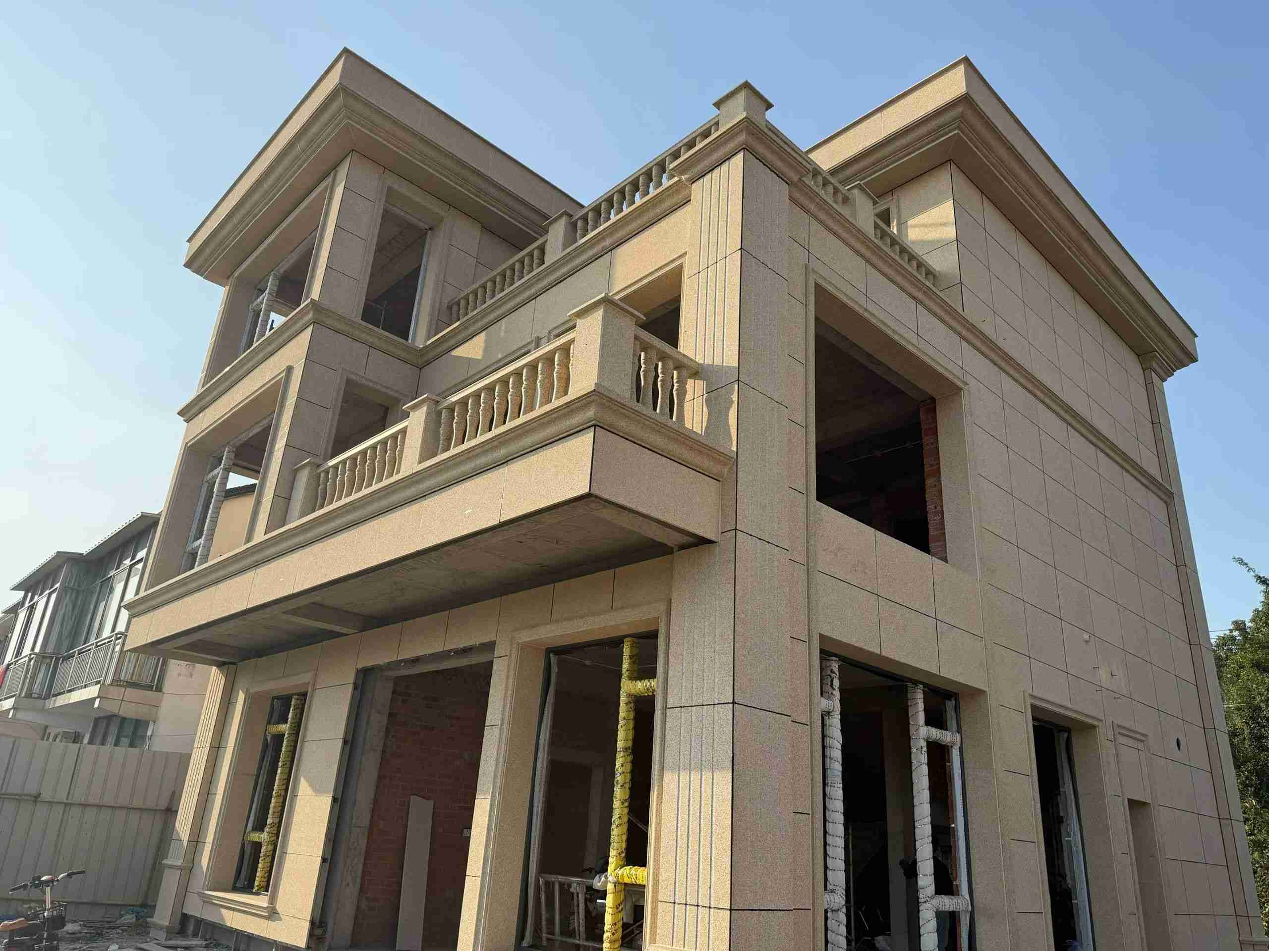 濮阳 黄金麻花岗岩石材荔枝面外墙干挂效果展示